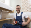 sanitary-technician-gesturing-thumb-up sanitary-technician-gesturing-thumb-up