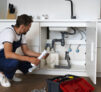 plumbing-professional-doing-his-job plumbing-professional-doing-his-job